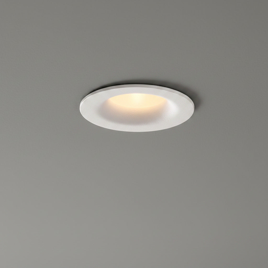 white LED ceiling downlight mounted in a grey ceiling 