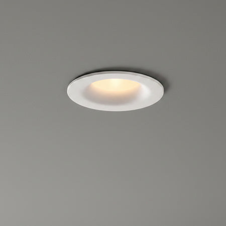white LED ceiling downlight mounted in a grey ceiling 