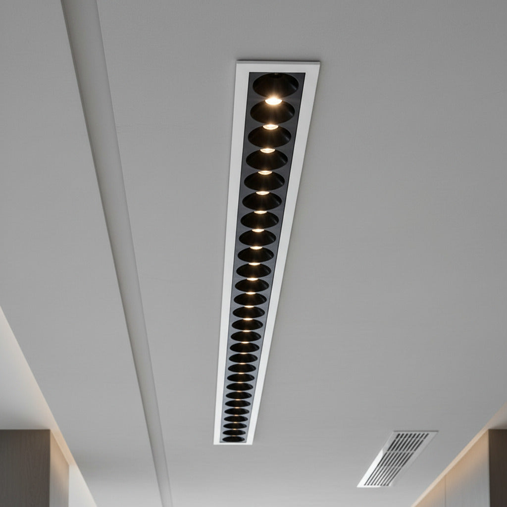linear recessed downlighter installed in a modern hotel room