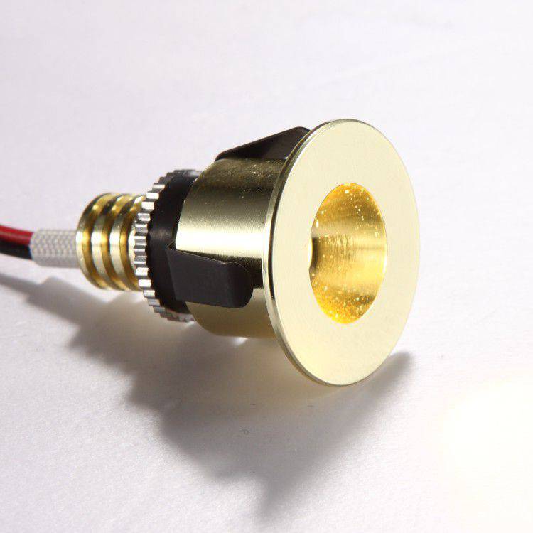 gold kitchen plinth LED light shown on a white background 