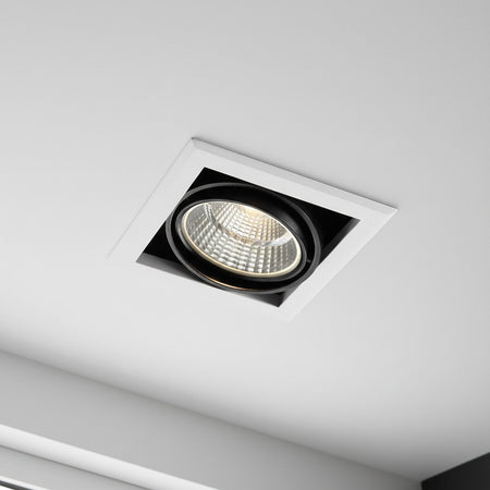 commercial downlights mounted in the ceiling in a showroom
