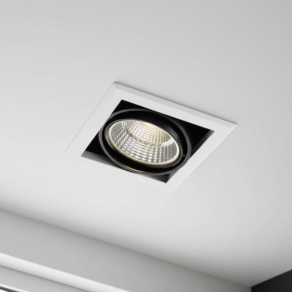 commercial downlights mounted in the ceiling in a showroom