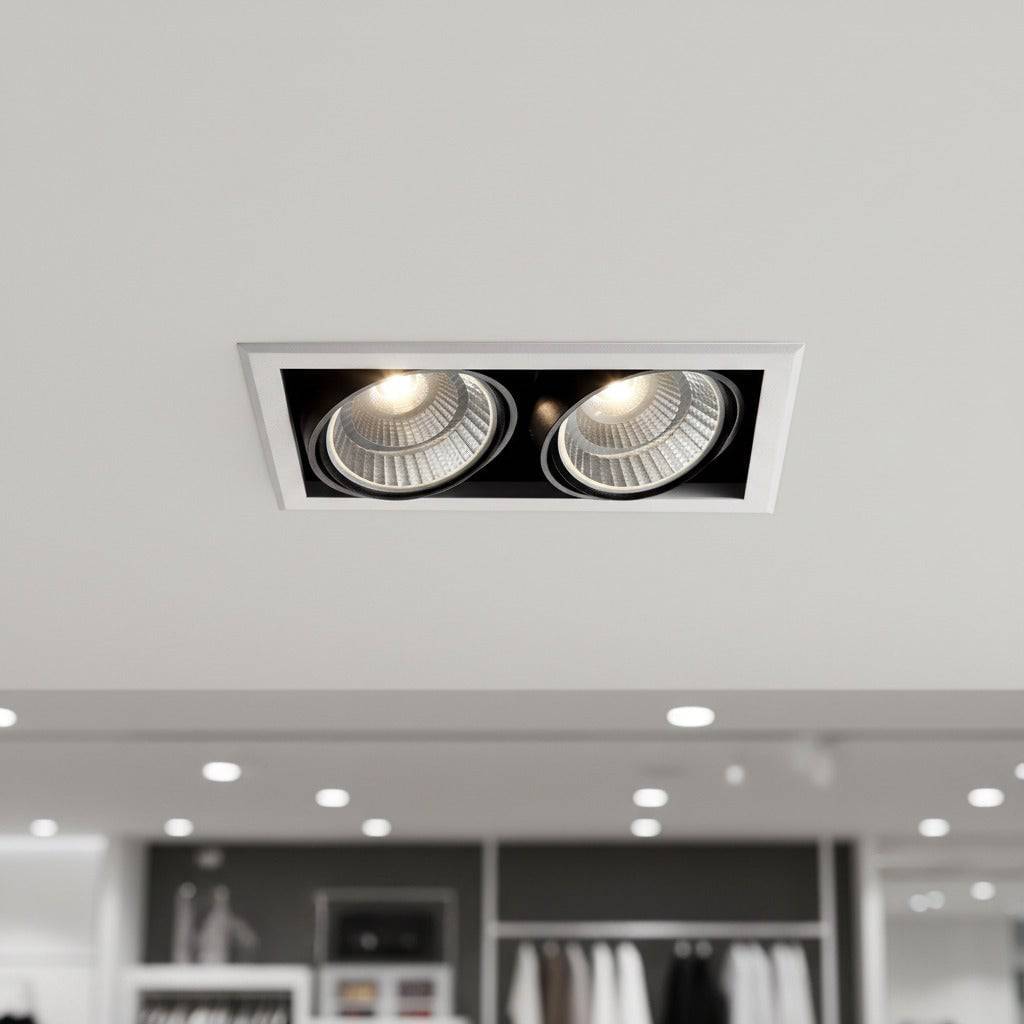 commercial recessed downlight shown mounted in the ceiling in a shop