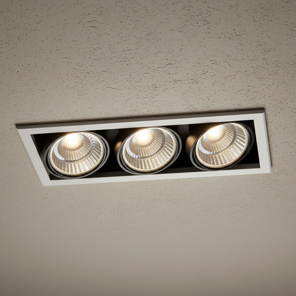 commercial recessed ceiling spotlights installed on a textured hotel ceiling 