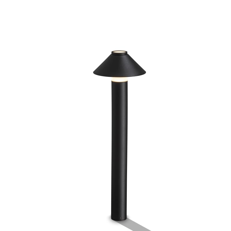 Black outdoor garden bollard light on white background