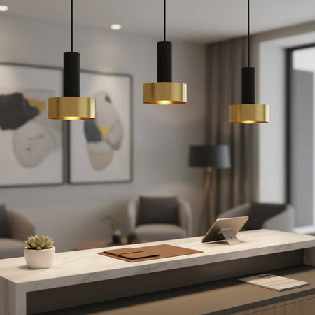 Gold pendant light fixture in a hotel reception 