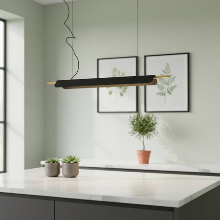 Linear suspension light above a breakfast bar in  modern home