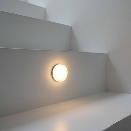 strair tread light installed on an indoor stair riser 