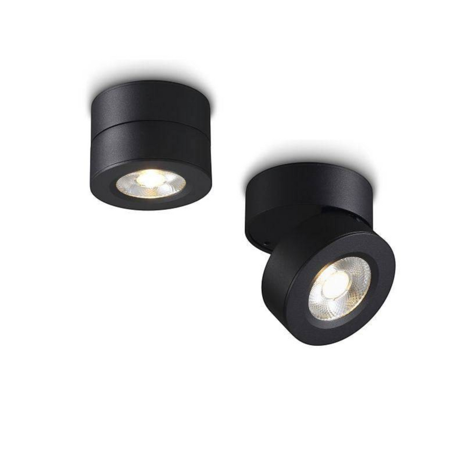 black adjustable surface mounted downlight on a white background