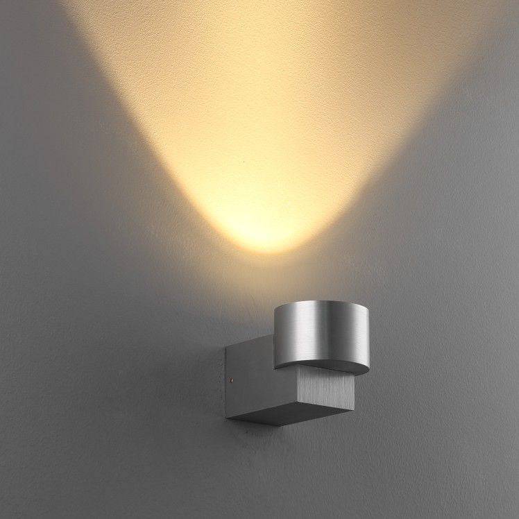 Silver indoor wall uplight  on a grey background