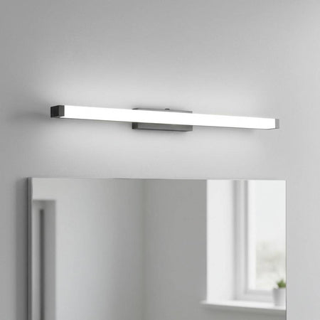 black modern bathroom light above mirror mounted in a modern bathroom on the wall 