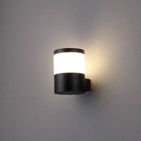 black outside wall lantern shown mounted on a white wall 