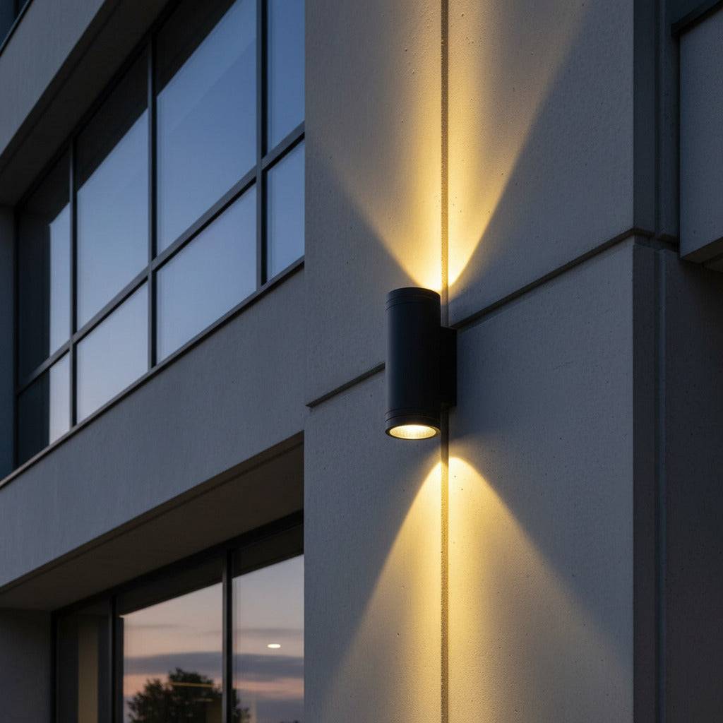 black large outdoor wall light mounted on the exterior wall of a commercial building