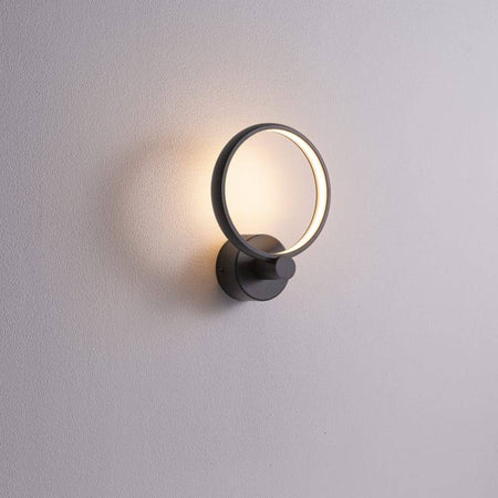 Black LED indoor wall lamp on a pale grey background
