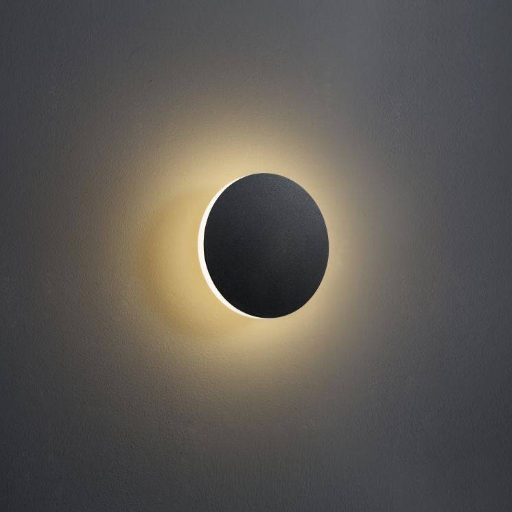  Modern black wall sconce on a grey background