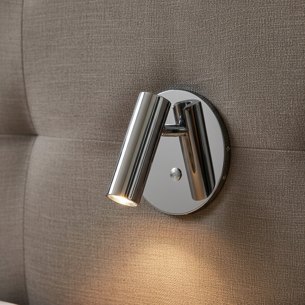chrome recessed adjustable bed reading lamp installed on a fabirc headboard