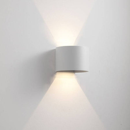 white outdoor up and down light shown on a white background wall 