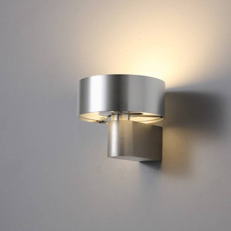 Silver interior lantern wall sconce on grey background