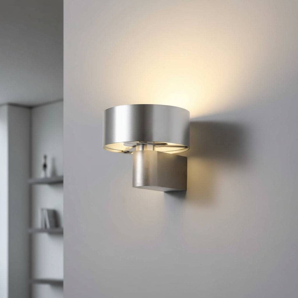 Silver finish interior lantern wall sconce on a neural coloured wall in a modern home