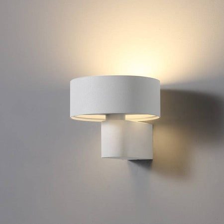 White wall mount interior light on a grey background