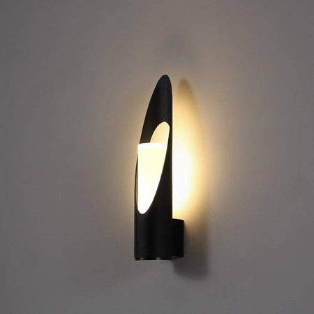 black outdoor LED wall lantern mounted on a white wall