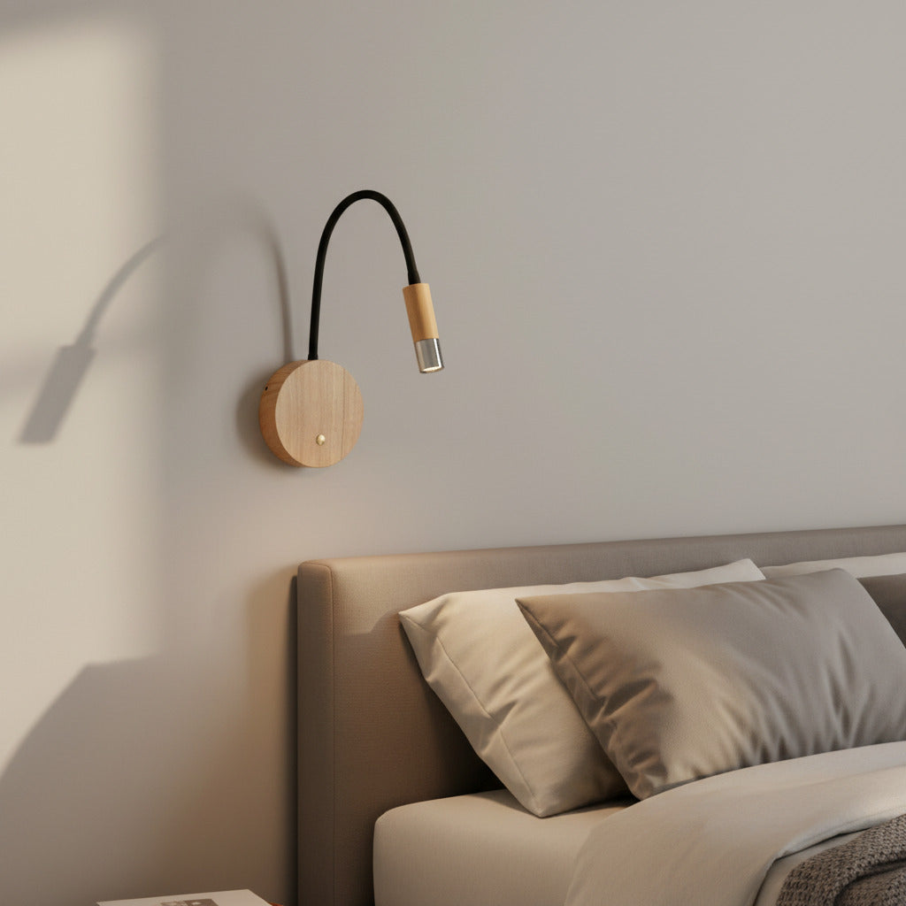 chrome flexible wooden reading light mounted over a bed 