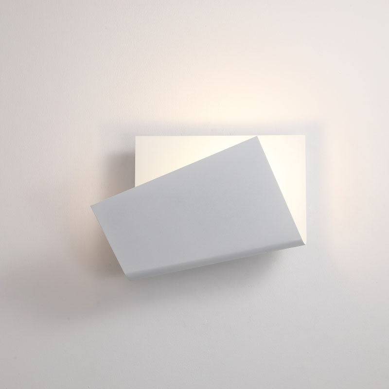 White indoor wall sconce on a white background