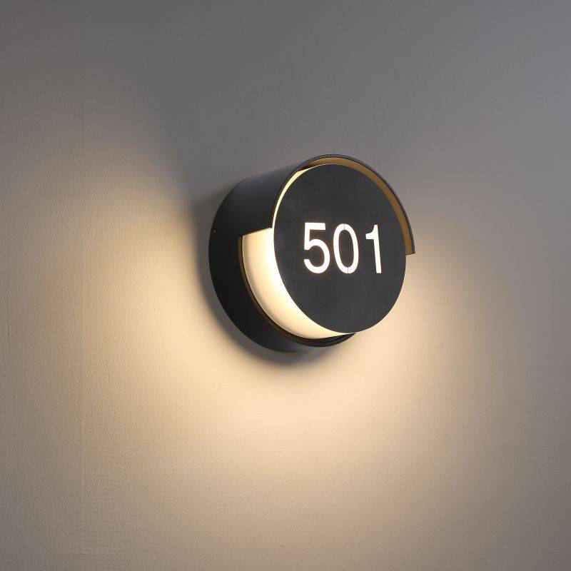 LED hotel room number sign mounted on a white background