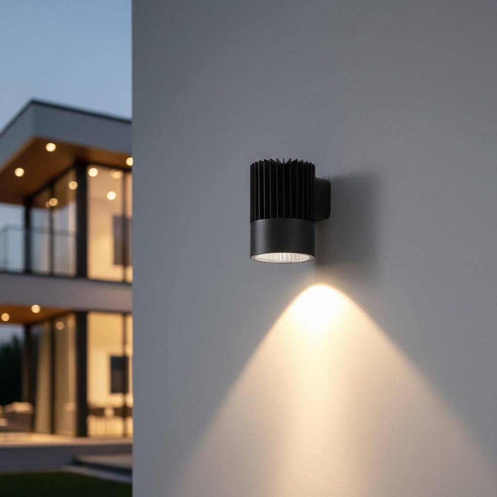 black large outdoor wall downlight mounted on the exterior white wall of a modern home 