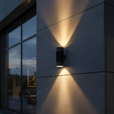 large exterior wall light mounted on the concrete wall of a commercial type building