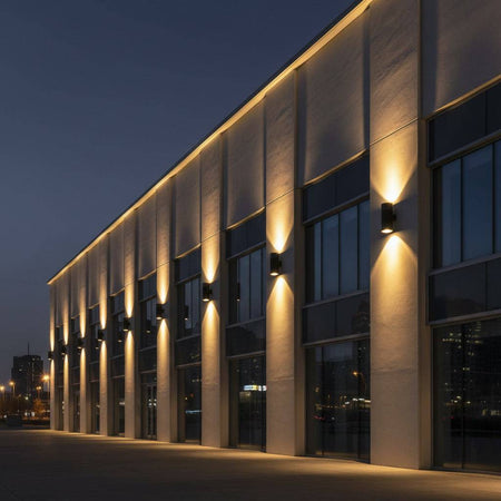 large exterior wall light showing a number of lights mounted along the wall of a large commercial building