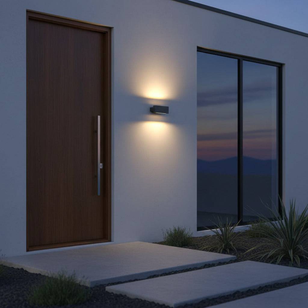black up and down light mounted next to a wooden front door outside a modern house 