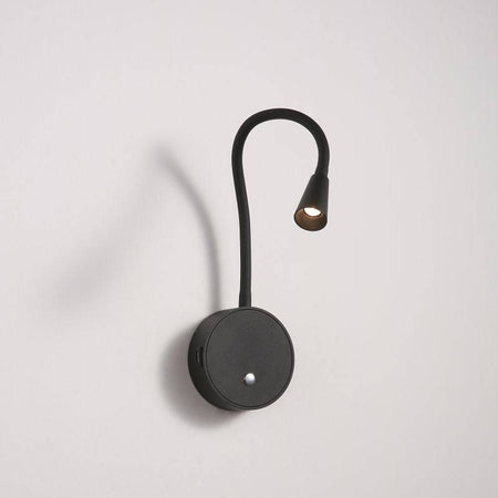 black flexible LED reading light installed on a white wall 