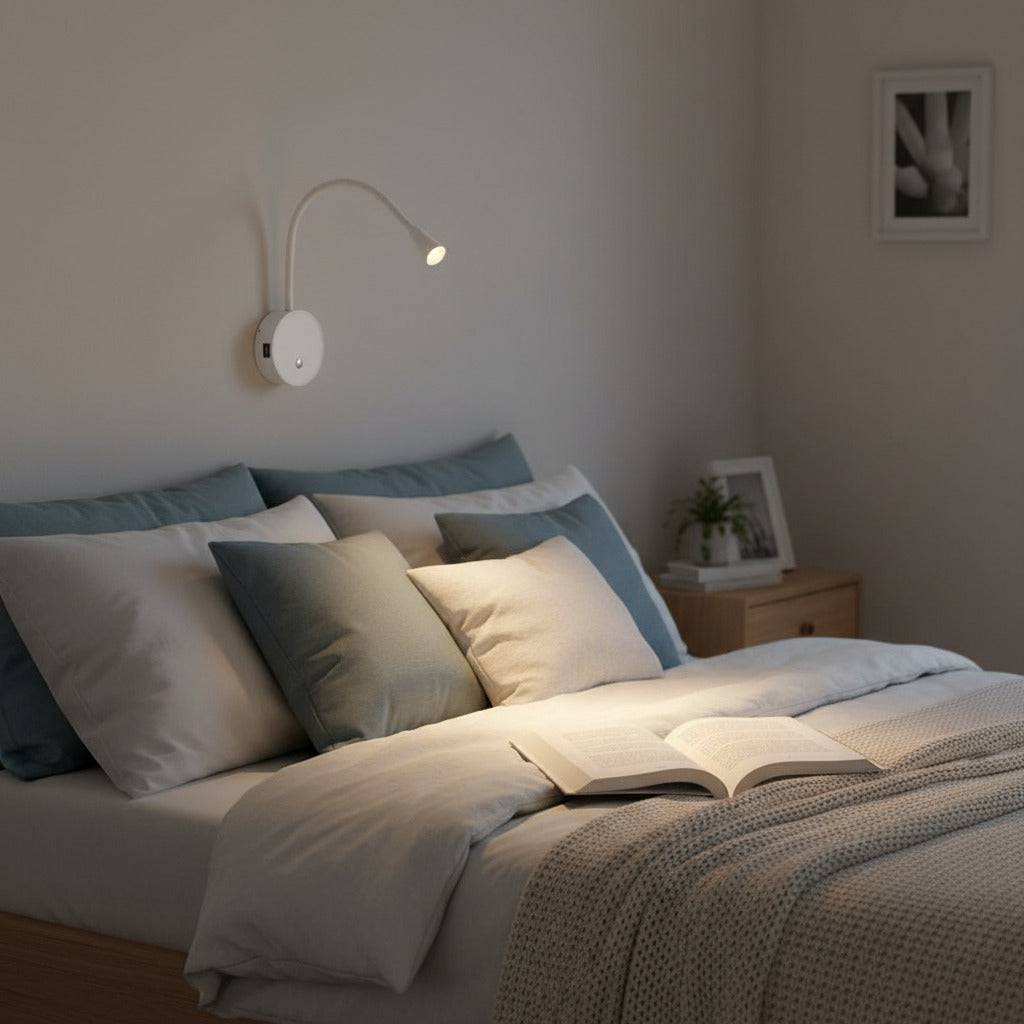 white flexible LED reading lamp installed over a bed in a modern bedroom
