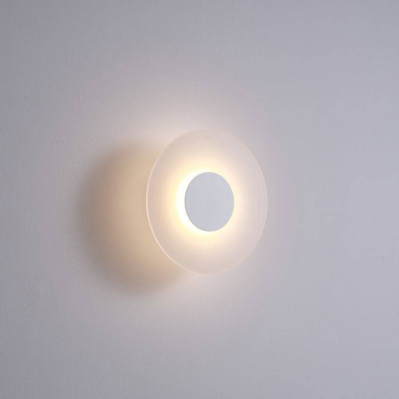 White modern outdoor wall light mounted on a white wall 