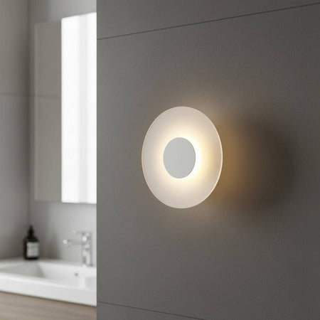 white IP65 bathroom wall sconce mounted on the wall in a modern bathroom 