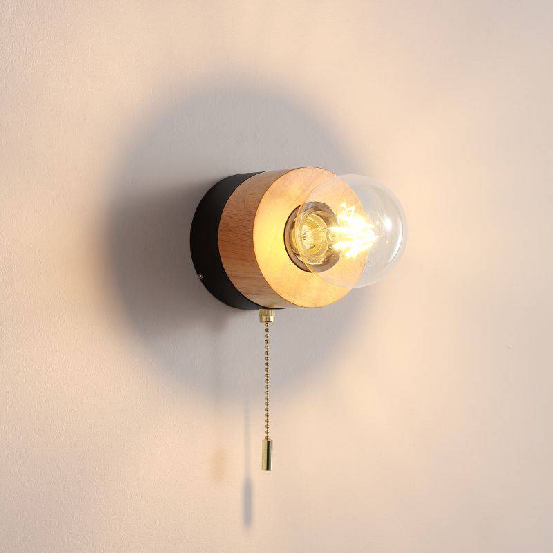 Black wall light indoor with pull cord on white background