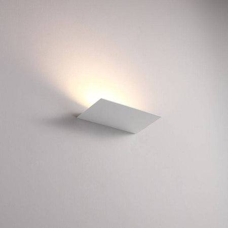 White indoor upplight wall light on a white background