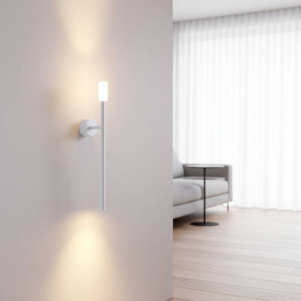 White up down interior wall light on a light background in a lounge area of a modern home
