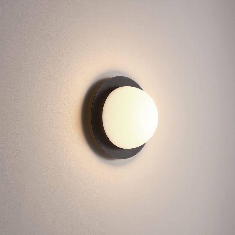 Black modern interior wall light on a white background