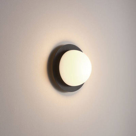 Black modern interior wall light on a white background
