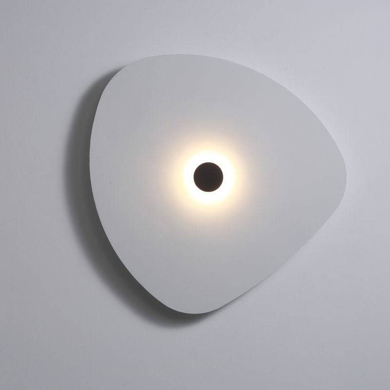 White indoor decorative wall sconce on a white background