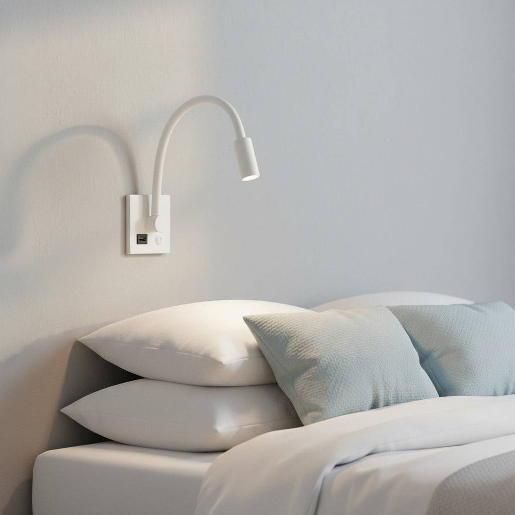 white recessed reading lamp with USB port mounted over the bed in a modern clean bedroom