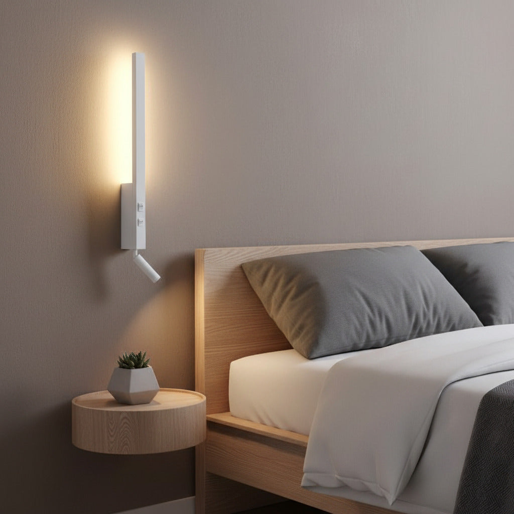 white bedside wall light with reading light mounted next to a bed on the wall 
