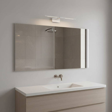 white over bathroom cabinet light mounted over a bathroom cabinet in a modern bathroom