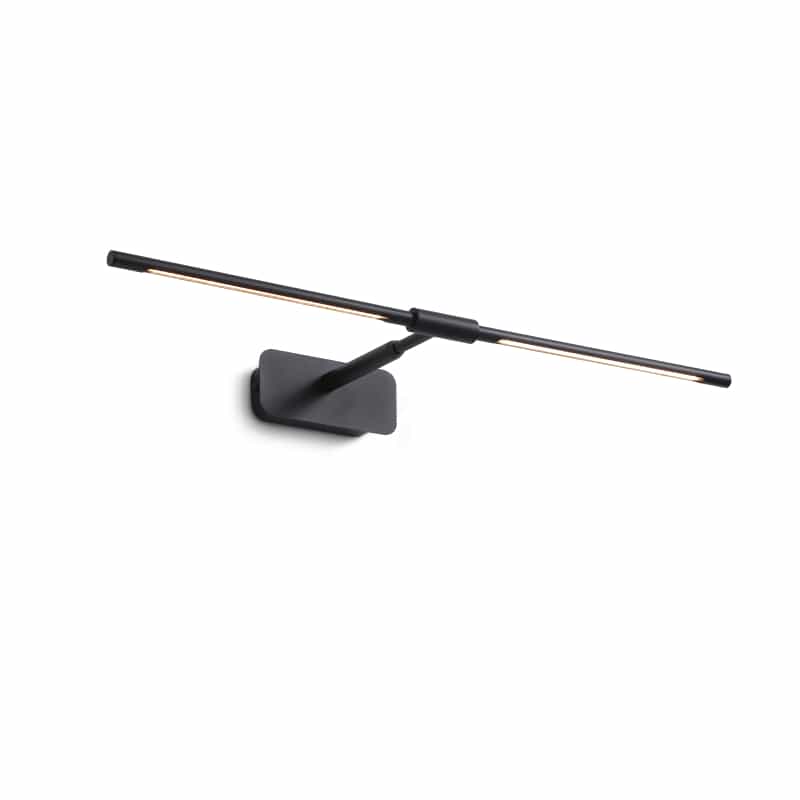 black bathroom sconce over mirror mounted on a white wall 