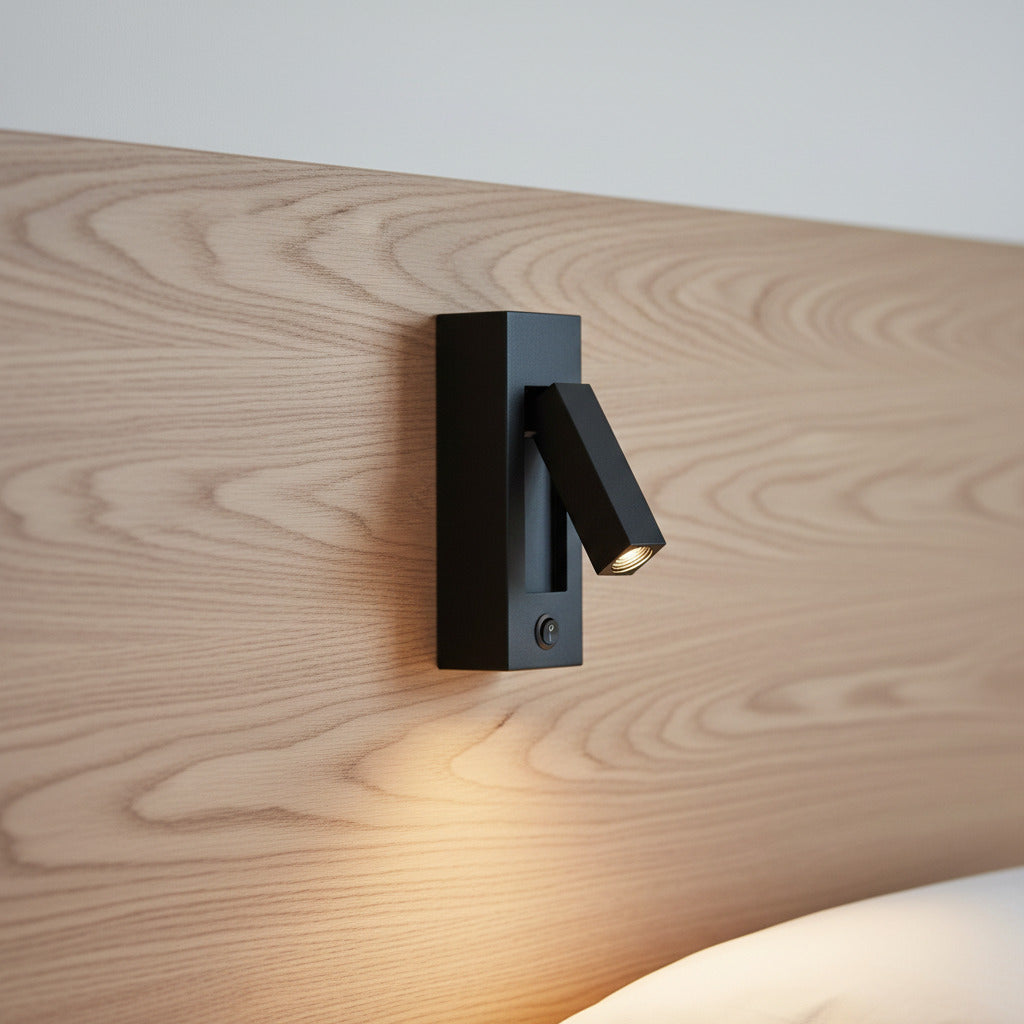 black wall mounted reading lamp mounted on a wooden bed headboard 