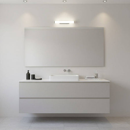 black LED bathroom mirror light mounted over a wide bathroom mirror 