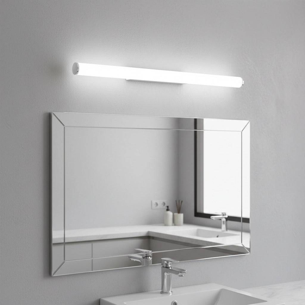 white bathroom vanity mirror light mounted over a mirror in a modern neutral bathroom