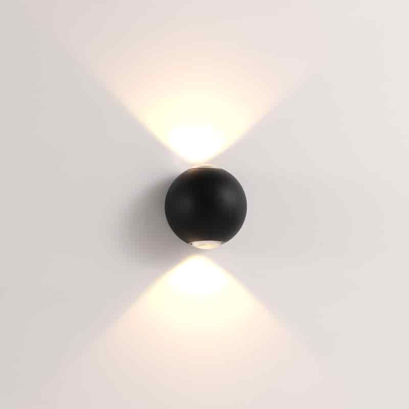 black up and down garden wall light shown mounted on a white wall 
